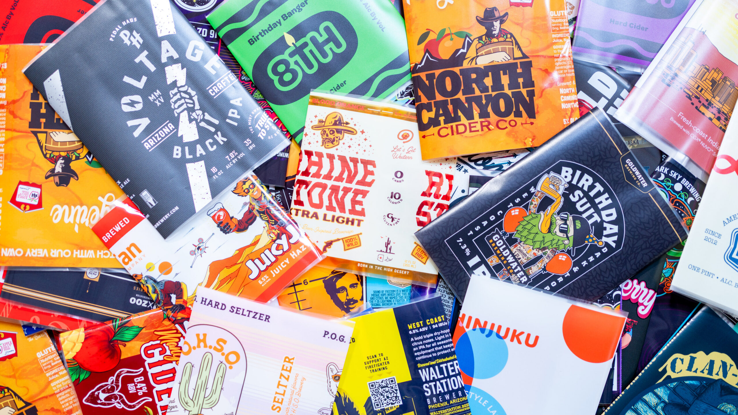 Pile of different shrink sleeve labels