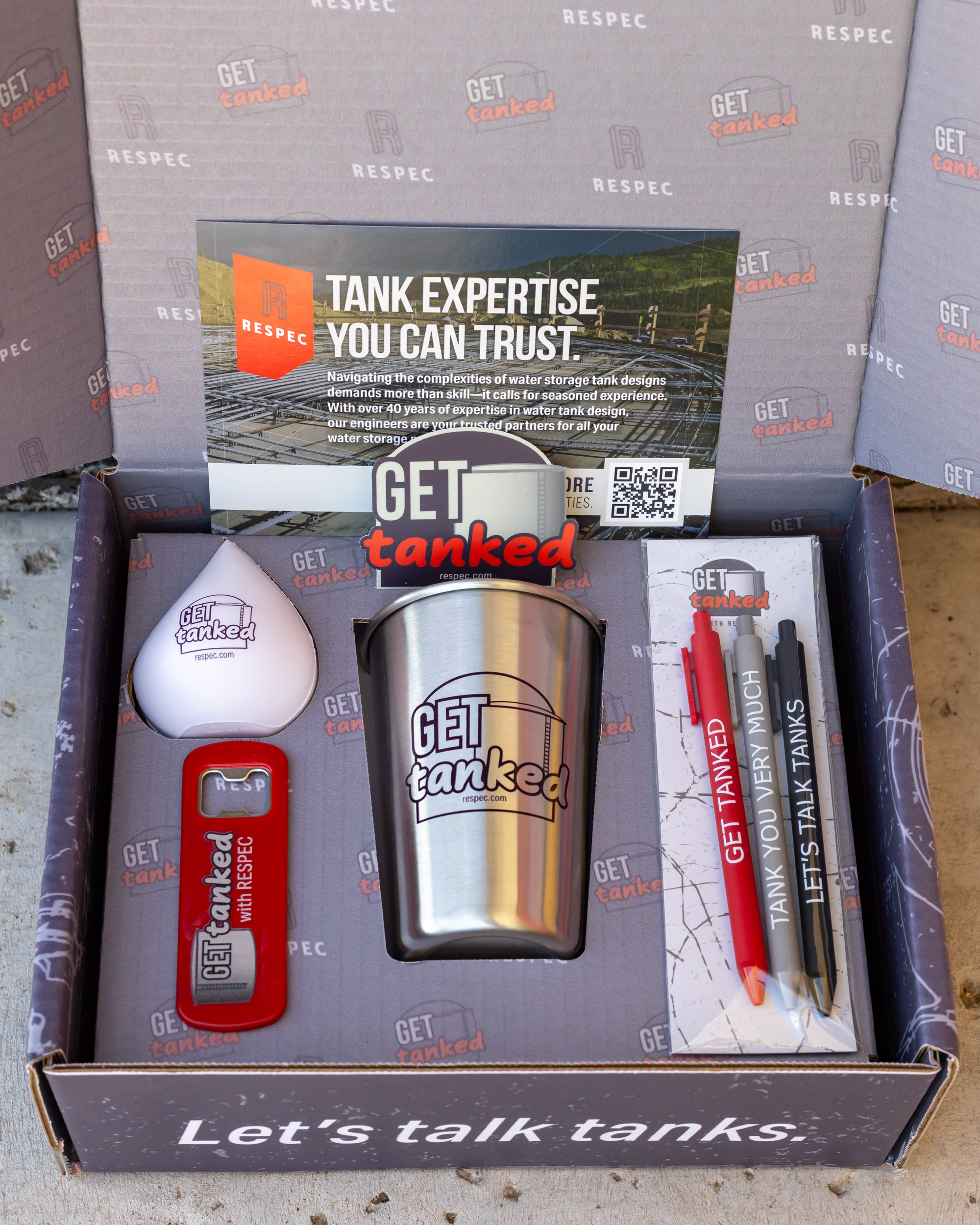 Opened Respec brand box with promo items and card