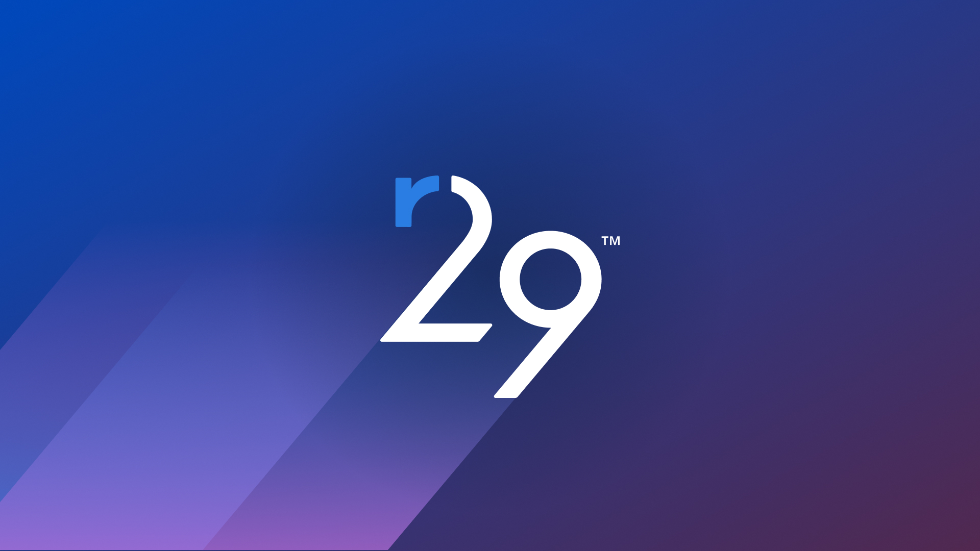 White Rule29 logomark on blue gradient background